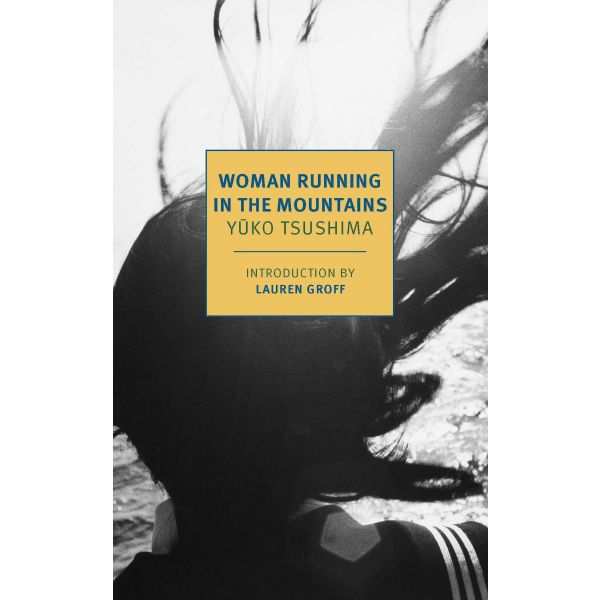 WOMAN RUNNING IN THE MOUNTAINS